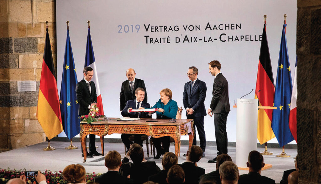 Les liaisons transfrontalières, maillons faibles de l'Europe du train 1 Signature du traitéfranco-allemand d’Aix-la-Chapelle, en 2019.